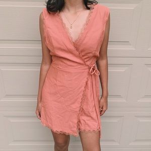 Salmon color wrap romper